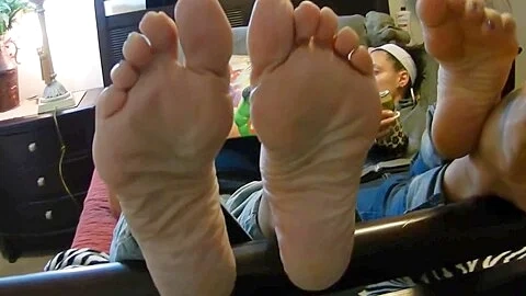 Two Gorgeous Housewives Expose Their Soft Mature Feet As Laying In Bed Reading Magazines