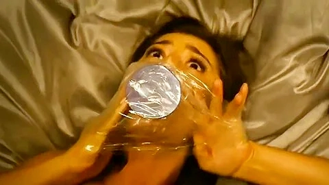 Gagged With A Dildo