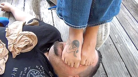 Stunning Mistress With Hot Tattooed Feet Tramples Her Fat Slave At The Balcony