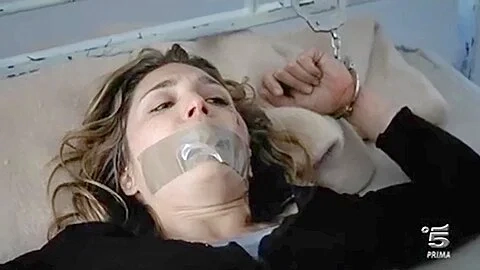 Cuffed To A Bed